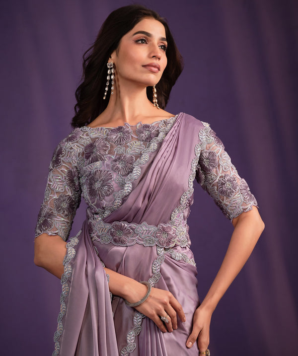 shaadi party wear lilac satin saree with readymade blouse and ornated belt