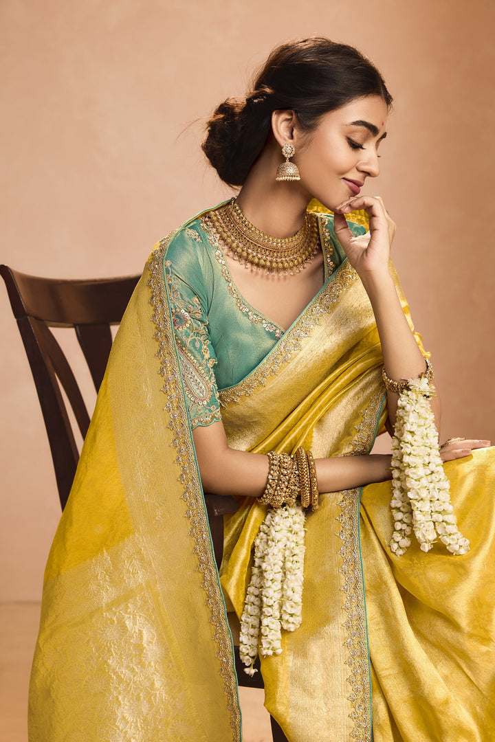 haldi fashion yellow tissue silk saree